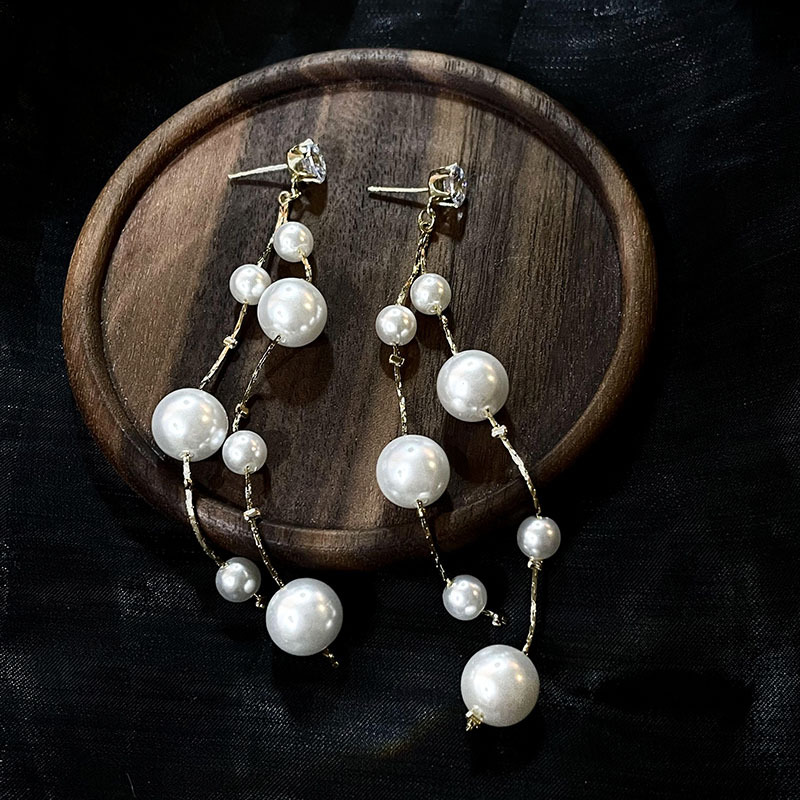 科技與時(shí)尚完美融合，最新長(zhǎng)款珍珠耳飾款式亮相！